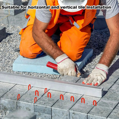 Worker using Horseshoe Shims Kit Color Coded U Shaped Plastic Leveling Shims 2x1.3in for tile installation alignment.
