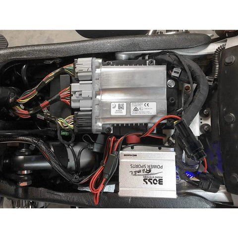 Nilight 50020R two-pin waterproof wire terminal connectors on an automotive wiring harness beside an electronic control unit.