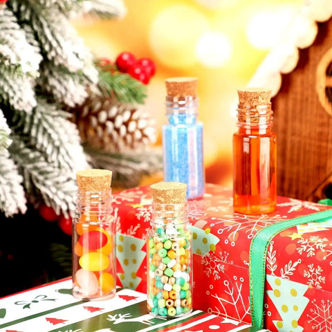 100 Pack Mini Plastic Bottles With Cork Stoppers And Eye Screws Craft Kit displayed with colorful candy and beads.