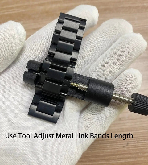 Watch Band Link Removal Kit For Metal And Stainless Steel Bands Pro Grade Tool Free Sizing Pin Remover held in gloved hand
