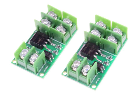 Isolated MOSFET Switch Module Pack Of 2 with high low level trigger for DC control 5 to 36V output and 3 to 24V input shown in green circuit boards