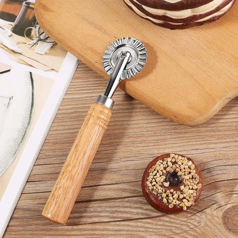 Fluted Pastry Wheel Cutter For Homemade Pasta And Ravioli, Durable Dough Cutter With Perforated Wooden Handle on kitchen table