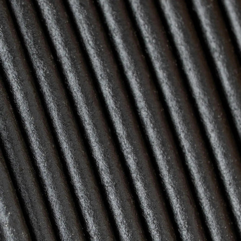 Close-up of Panchroma Matte PLA Filament Charcoal Black 1.75mm 1kg For FDM Printers showing textured matte surface.