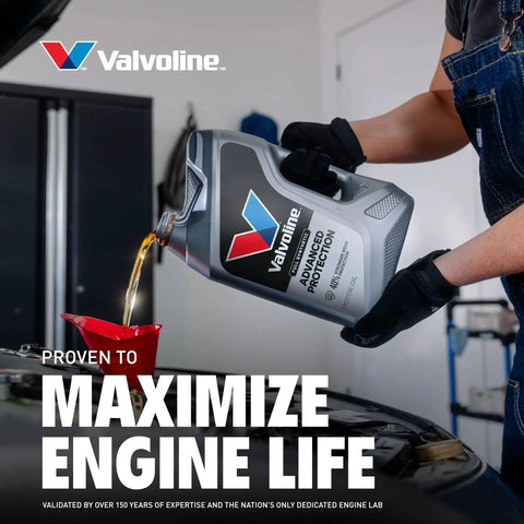 Pouring Advanced Synthetic 0W-20 Motor Oil 5 Quart With Superior Wear and Deposit Defense into engine