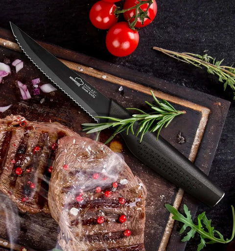 Eight Piece Steak Knife Set With Stainless Steel Serrated Blades, Rust Resistant Nonstick Coating; black handle knife next to steak and herbs