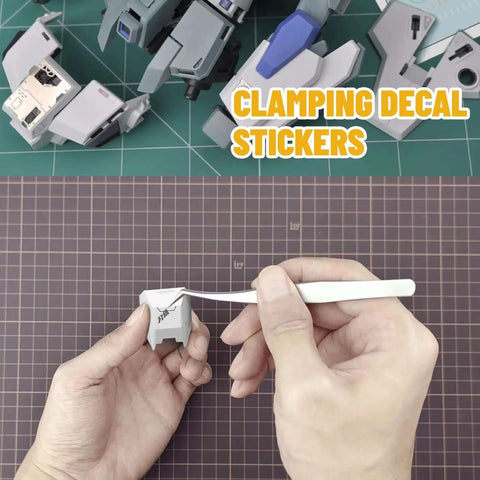 Hand using Ultra Precision Stainless Steel Tweezers Set With Two Pieces For Gundam And Scale Models to apply decal sticker
