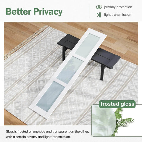 Double 18x84 White Frosted Glass Bifold Barn Door Set panel on a rug, showing frosted glass design for privacy.