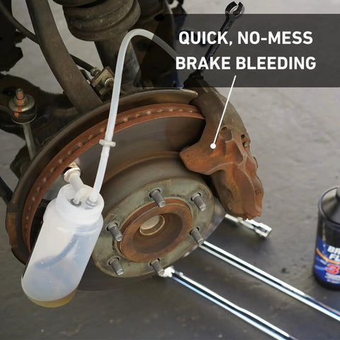 Cal-Spec Tools brake bleeder kit installed on a disc brake; white 16 oz catch bottle with clear hose
