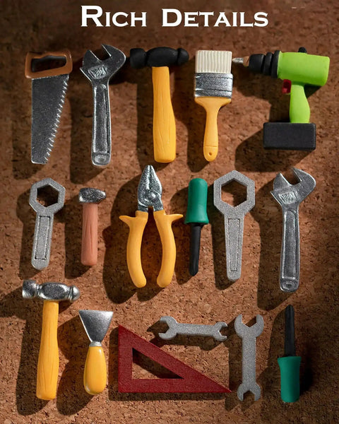 Miniature garage workshop tool set with yellow-handled tools: saw, wrench, hammer, pliers, chisels, screwdrivers, ruler.