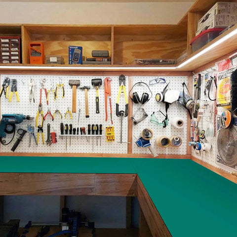 ESD Soldering Mat For Desk And Repair, Anti Static Grounding Work Surface, in workshop surrounded by tools, 23.7 x 118 Inches