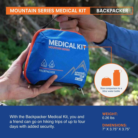 Person holding Backpacker First Aid Kit for Outdoor Trails Expedition Grade Medical Kit for Two Adventurers Up To Four Days