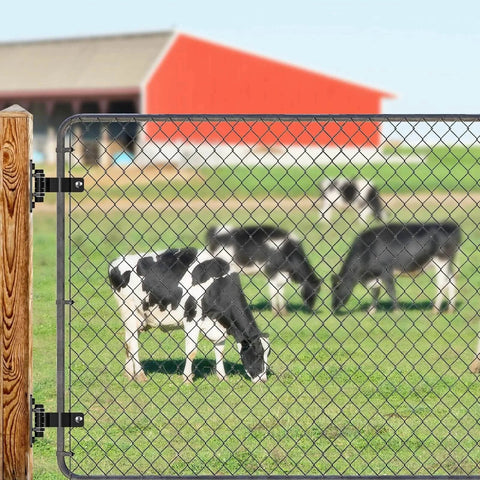 Heavy Duty Gate Hinges For Chain Link Fence Parts With Electroplated Finish And Removable Bolts For Wall Mount Fits One And Seven Eighths Inch Outer Diameter Posts Suitable For Farm And Fence Gates Black 2 Pack installed on a farm gate.