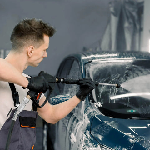 Power Town ball valve pressure washer gun with 3/8 inch quick-connect, stainless steel, used to wash a blue car.