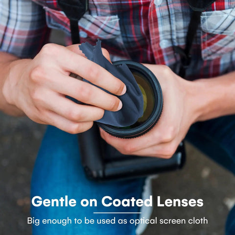 Person using Microfiber Cleaning Cloths For Glasses And Screens 6 Pack Large Lint Free on camera lens.