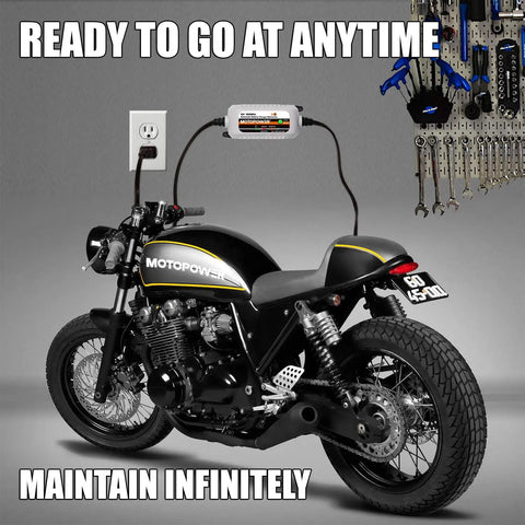 All-in-One 12V Battery Charger, Maintainer, Trickle Charger and Desulfator With Timer Protection connected to a motorcycle.