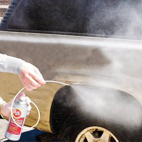 Person using Beefed Up Heavy Duty Rust And Corrosion Protection Aerosol Spray With 24 Inch Extension Hose And Nozzle on car fender.