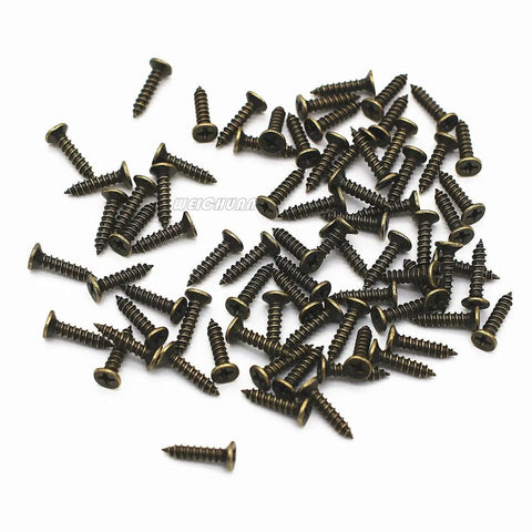 Antique bronze screws for 20 Pack Antique Bronze Zinc Alloy Label Frame Drawer Pulls for Drawers and Cabinets, scattered on white background.