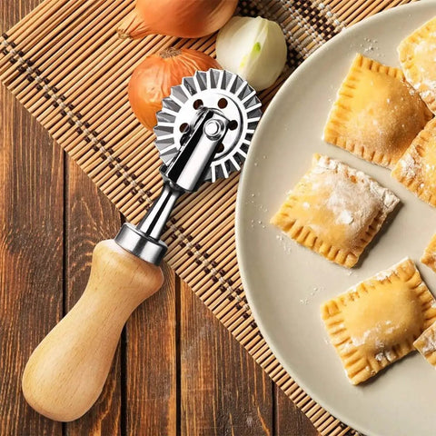 Ultimate Pasta Wheel Cutter With Wood Handle And Aluminum Frame For Home Kitchen near ravioli pasta on plate.