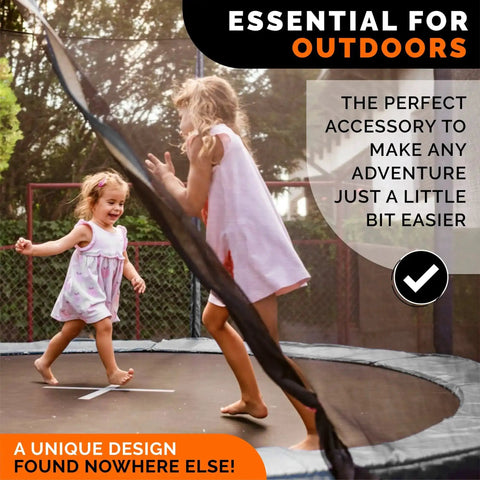 Children playing on a trampoline, emphasizing the need for Heavy Duty Steel Screw Ground Anchors Set Of 4 for safety.