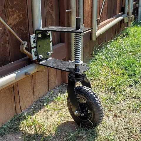 Universal 8 Inch Flat Free Tire Gate Wheel With Suspension Spring Loaded Wood Chain Link Gate Caster Weight Capacity 200 Lb installed on metal gate