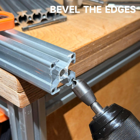 Pro Grade Beefy All Metal Aluminum Profile Drill Guide Kit With Access Hole Jig attached to aluminum extrusion, beveling edges
