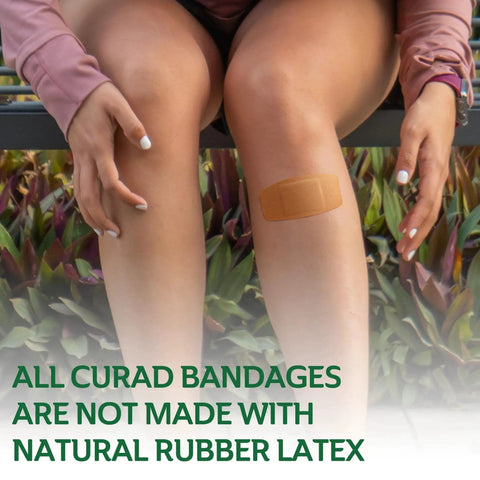 Woman with bandage on knee from 320 Count Assorted Bandages Variety Pack With 5 Styles Waterproof Sheer Plastic Heavy Duty Flex Fabric