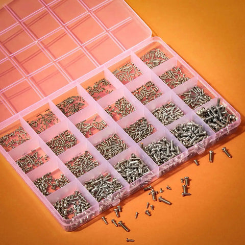 Mini Pan Head Screws Kit For Eyewear And Small Electronics 1200 Pcs In 24 Sizes With Clear Storage Box displayed on orange surface