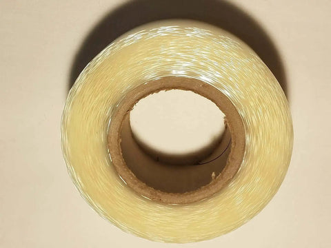 Top view of a roll of Two Inch By Zero Point Zero One Five Inch By One Hundred Foot Urethane Die Protection Film for press brake jobs.