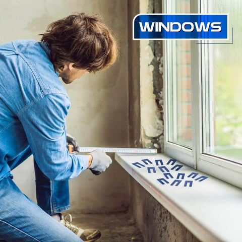 Man using 200 Pcs Horseshoe Tile Spacers U Shaped One Sixteenth Inch For Tile Leveling System Blue Levelers for window installation.