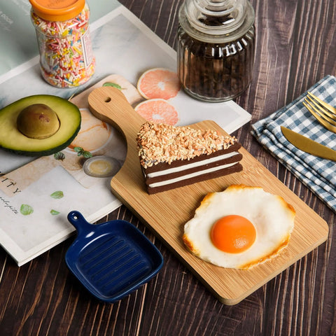 Thick Bamboo Cutting Board Set Of 6 11x5 Inch Ultra Sturdy 0.39 Inch Thick Wood Chopping Boards With Handle And Hanging Hole with food on top.