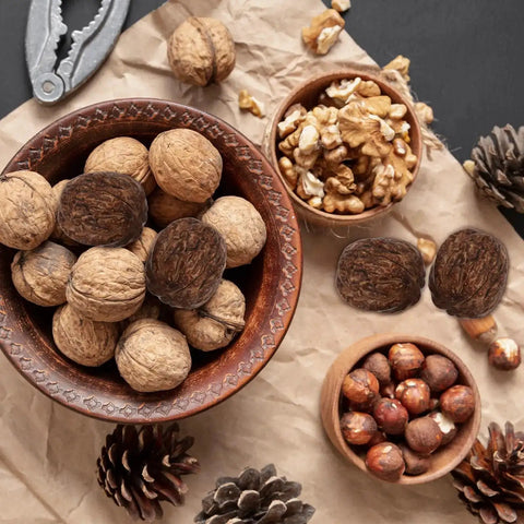 24Pcs Realistic Artificial Walnut Nuts Miniature Faux Fruit Photo Props For Home Table Display with wooden bowls and pinecones