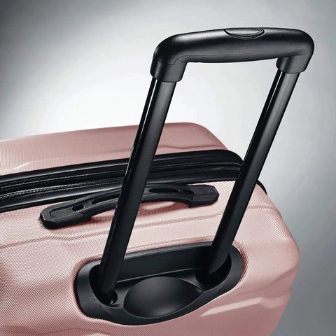 Close-up of handle on Omni PC Hardside Expandable Luggage Set With Spinner Wheels 20 24 28 Pink showing durable polycarbonate shell.