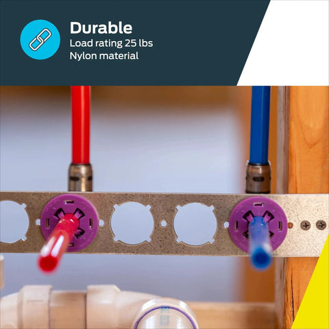 PexRite Stub-Out Clamp For 1/2 In CTS Pipe Tool-Free Pipe Support installed in bathroom wall with red and blue pipes.