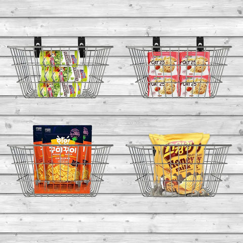 Slatwall baskets holding packaged snacks mounted on a slatted wall for organization and display