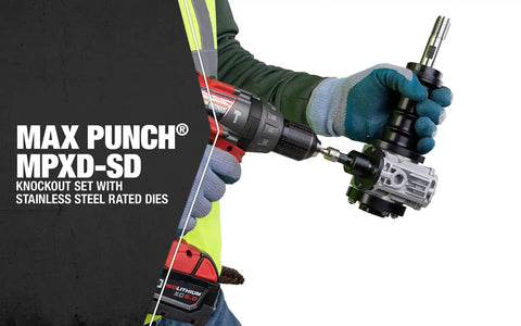 Worker holding cordless drill with Knockout Punch Driver Kit for Quick, Precise Hole Cuts, featuring removable draw studs.