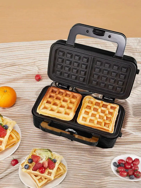3-In-1 Sandwich And Waffle Maker With Removable Nonstick Plates, 1200W Panini Press making waffles, open on tablecloth
