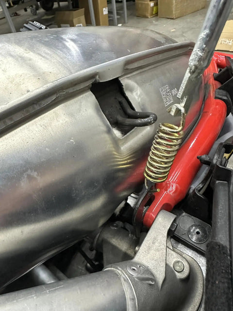 Exhaust Spring Removal Tool For Snowmobiles And Motorcycles Pull Push Twist in use on exhaust pipe spring
