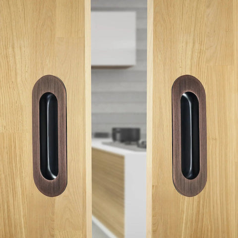 6 Inch Recessed Flush Pull Door Handle For Sliding And Pocket Closet Doors, Oval Pocket Finger Pull shown installed on wooden doors
