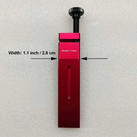 SRAM Hydraulic Disc Brake Caliper Piston Press Tool, 1.1 inch width, red aluminum, used for 2 and 4 piston calipers.