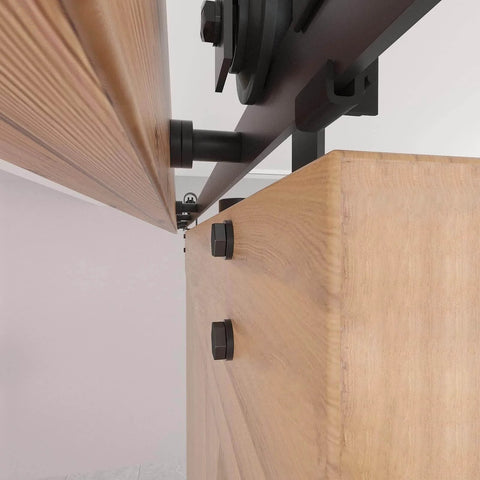 Close-up of 8FT Barn Door Hardware Kit with Heavy Duty Sliding Track, showing J Shaped Carbon Steel System installed on wooden door panel.