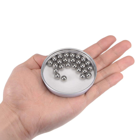 Hand holding 8mm Bearing Balls 304 Stainless Steel G100 Precision Balls 25pcs in metal case