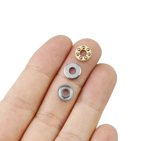 Miniature Thrust Ball Bearings 8mm Outer Diameter 3mm Bore 3 point 5 mm Thickness Chrome Steel F3 on fingertips