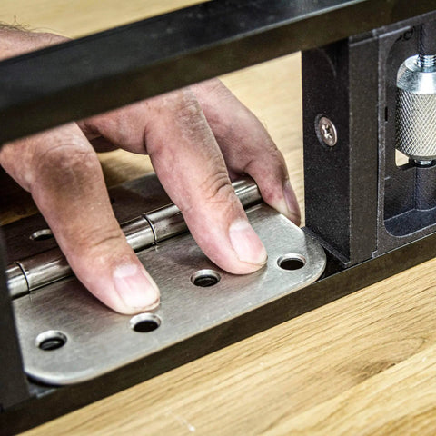 Butt Hinge Template Kit With Fully Adjustable Router Jig in use on wood door, showing hinge placement and adjustment mechanism