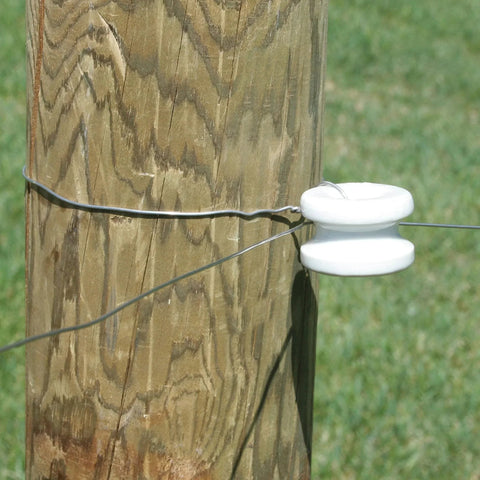 Corner Post Ceramic Insulators Pack Of 10 For Wood Posts One And Five Eighths Inch Diameter Fits Fence Wire Poly Wire Poly Rope And Half Inch Poly Tape Includes Washers installed on wooden post with fence wire