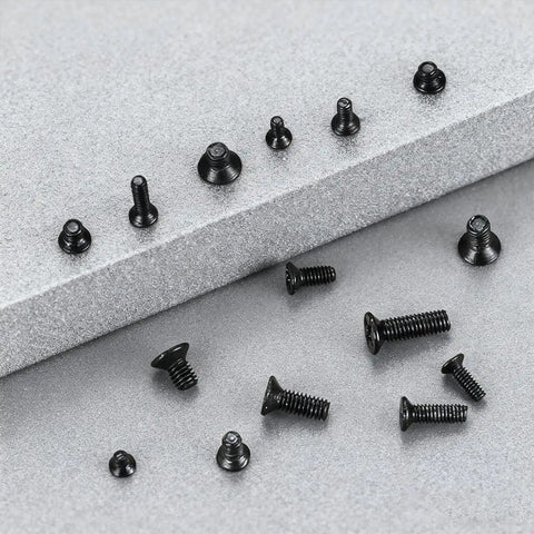Assortment of tiny carbon steel cross screws from 450 Piece Eyewear Repair Kit With Tiny Screws And Screwdriver Perfect For Glasses Sunglasses Watches.