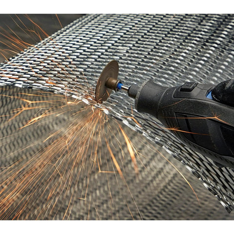 EZ Lock Rotary Tool Cut Off Wheels Kit By Dremel cutting sheet metal with sparks flying, showing 1 1/2-inch fiberglass-reinforced wheel.
