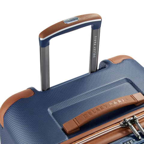 Close-up of handle and faux leather accents on Chatelet Air 2.0 Hardside Luggage Trunk With Spinner Wheels Navy Blue 26 Inch by Delsey Paris