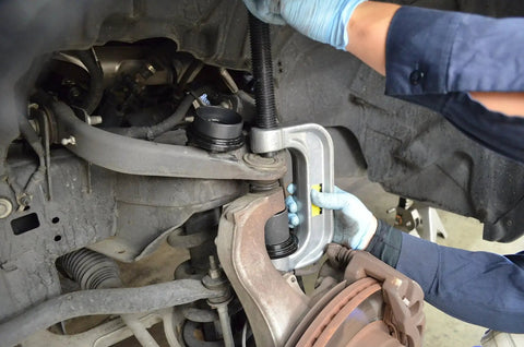 Installing ball joint using 21 Piece Ball Joint Service Tool And Master Adapter Set With Forged Alloy C Frame Press