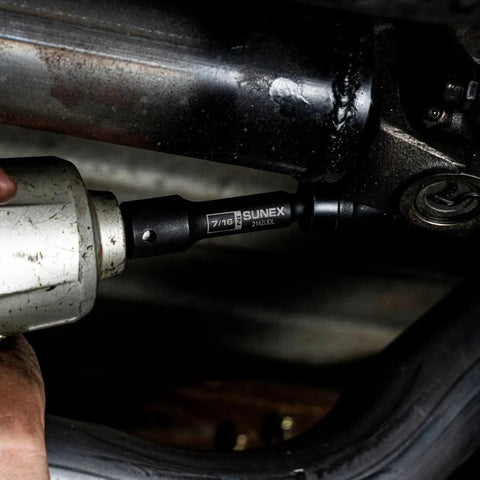 Mechanic using Limited Clearance 1/2 Inch Drive Socket Set, 12 Point, 9 Piece, Metric 8mm To 17mm on automotive part
