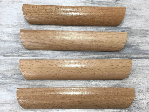 Four beech wood drawer pulls with smooth painted finish, showing the front view of Six Pieces 4.84 Inch Wood Furniture Pull Handles.